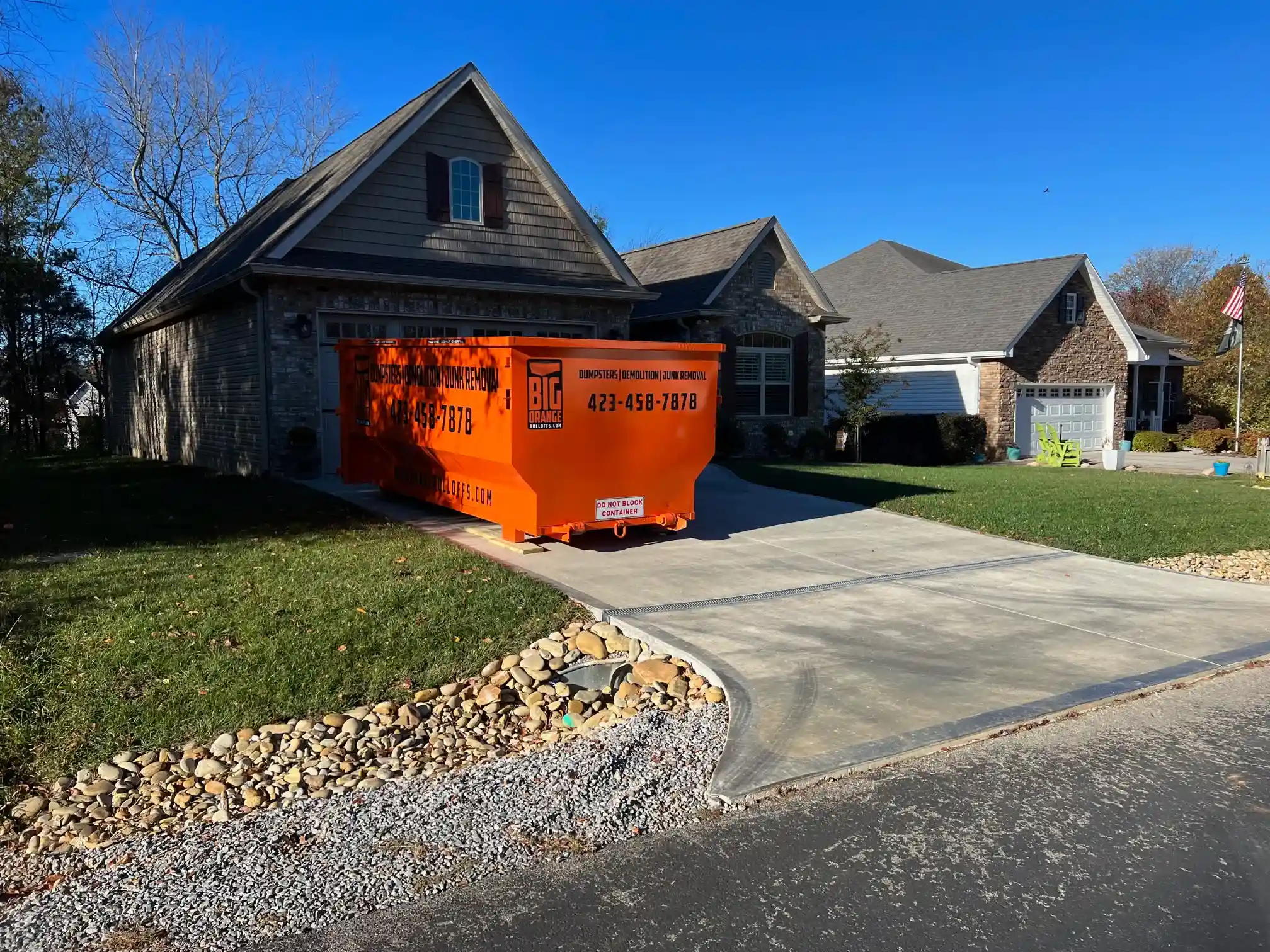 roll off dumpster in driveway