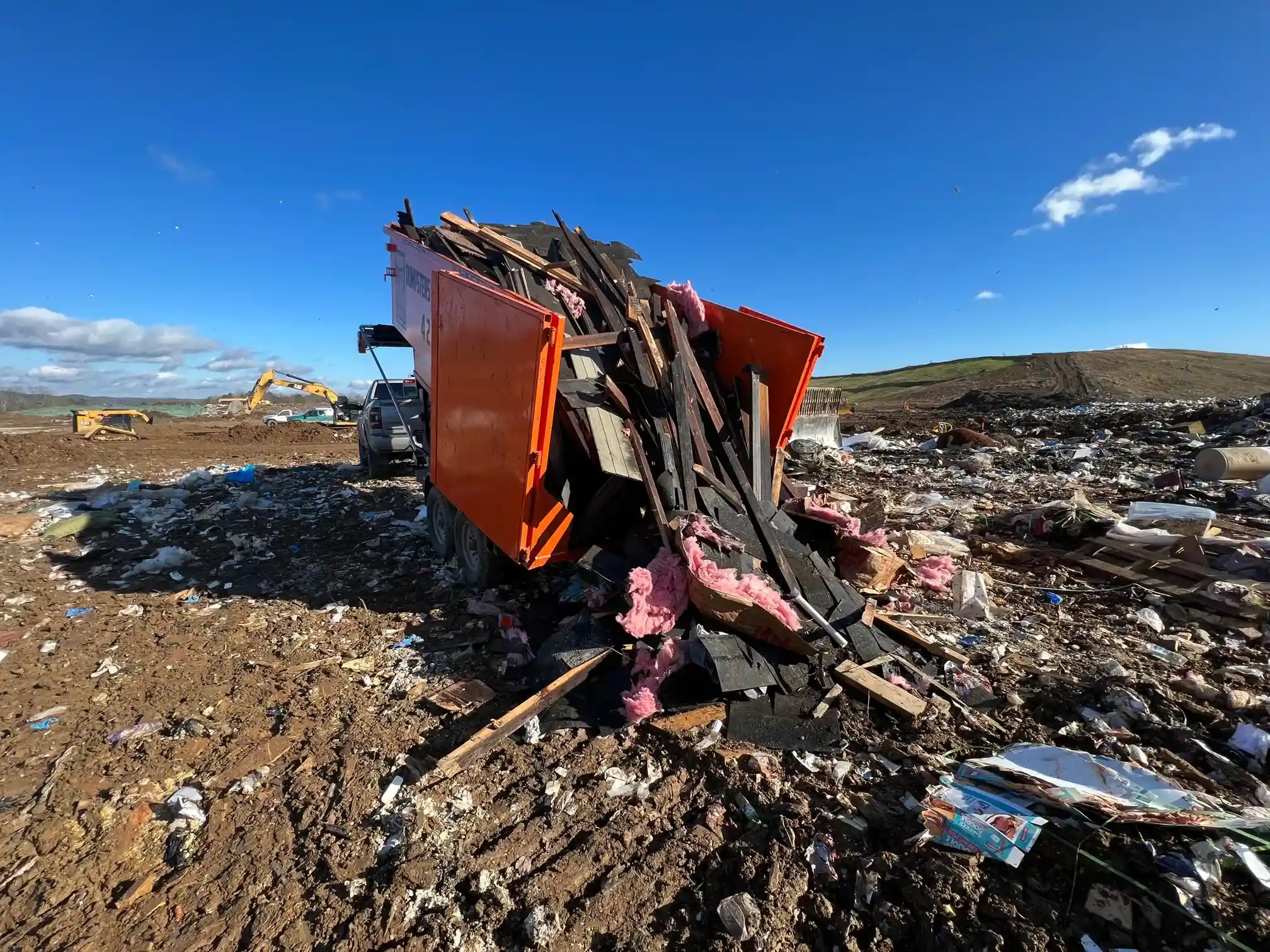dumpster at dump site